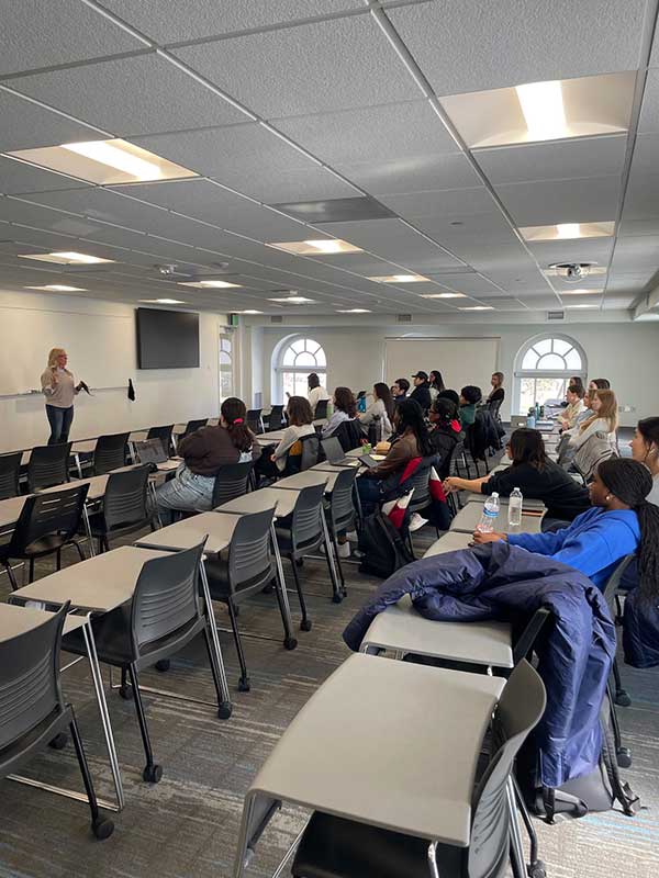 Melisa speaking at Notre Dame in 2024